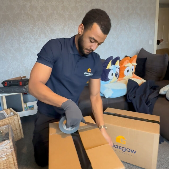 Glasgow Home Removals crew packing furniture securely